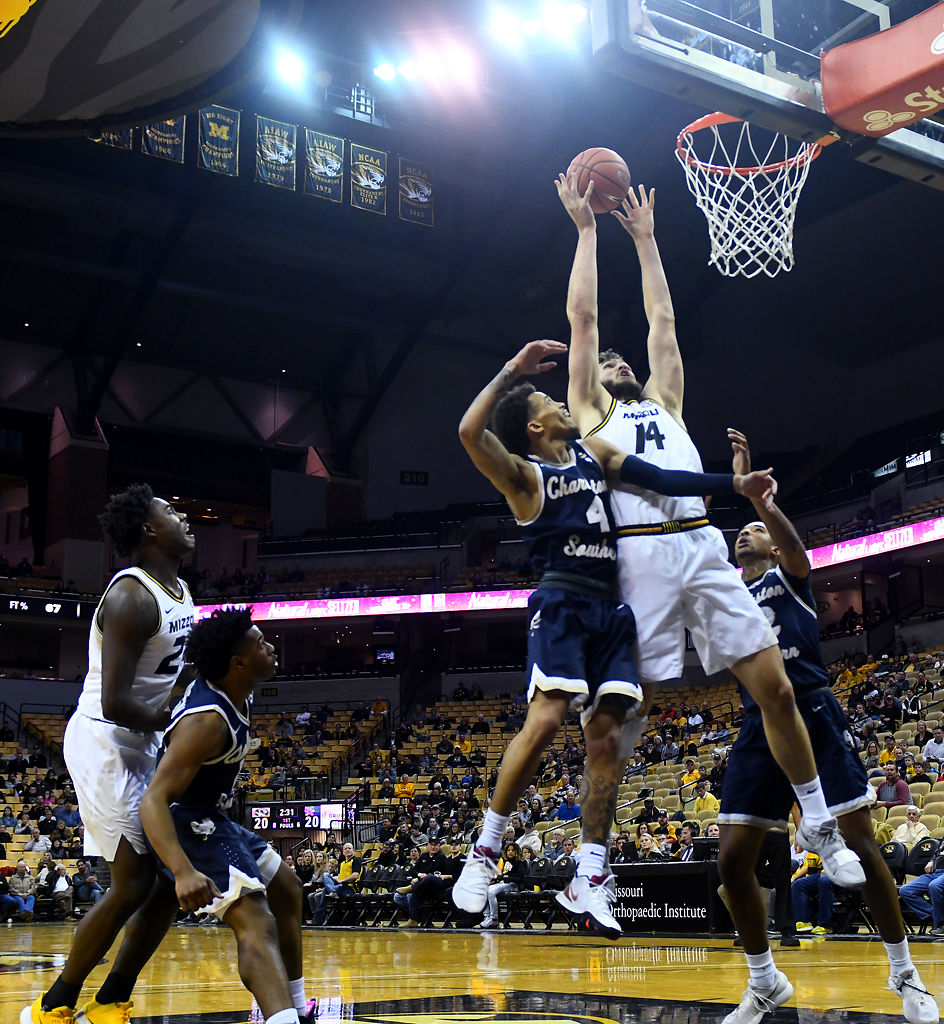 Reed Nikko fights for a rebound